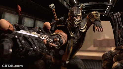 A Man In A Mask Is Holding A Sword In A Video Game GIF