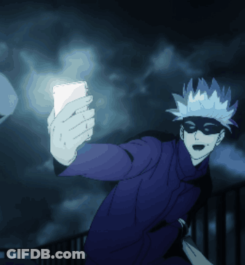 A Man In A Mask Is Taking A Selfie With A Cell Phone GIF