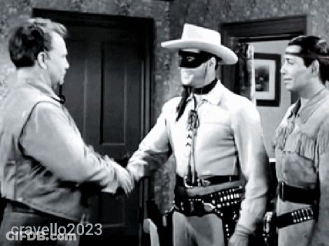 A Man In A Mask Shakes Hands With A Man In A Cowboy Hat In A Black And White Photo Taken By Cravello2023 GIF
