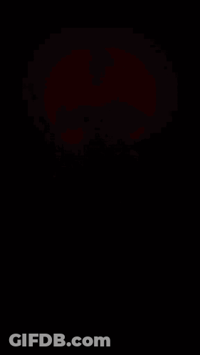 A Man In A Mask With Red Eyes Holds A Sword In Front Of A Red Moon GIF
