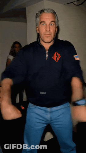 A Man In A Mezza Sweatshirt Is Dancing In A Room GIF