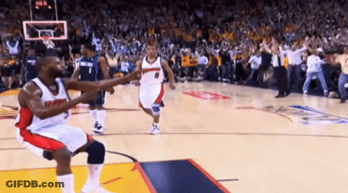 A Man In A Miami Jersey Is Kneeling Down On The Court GIF