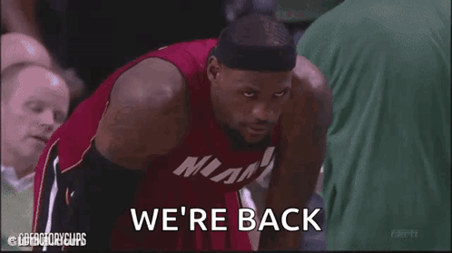 A Man In A Miami Jersey Is Saying " We 'Re Back " GIF