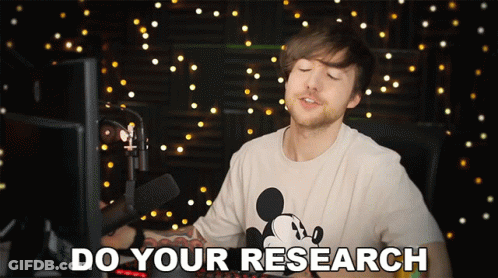 A Man In A Mickey Mouse T-Shirt Says Do Your Research GIF