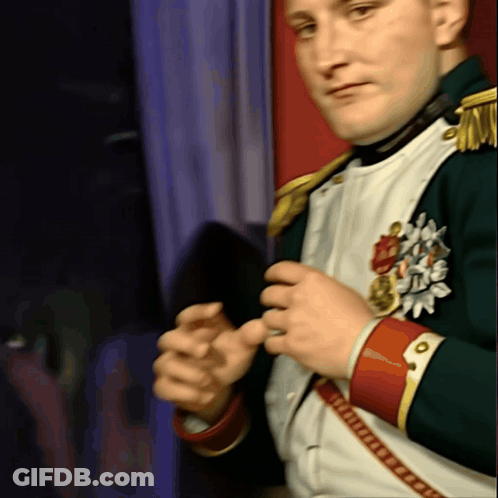 A Man In A Military Uniform Has A Medal On His Chest That Says ' Napoleon ' GIF