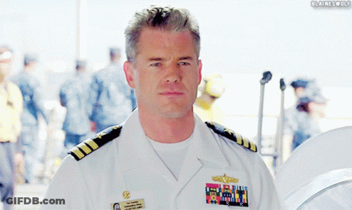 A Man In A Military Uniform Has A Name Tag That Says ' Blaine Wolf ' GIF