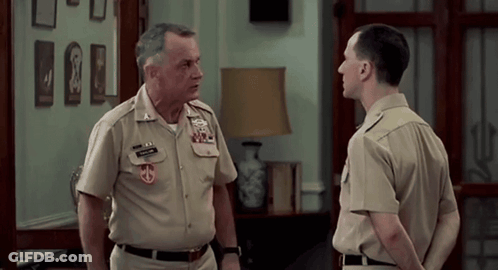 A Man In A Military Uniform Has A Patch On His Chest That Says ' U.s. Marine Corps ' GIF