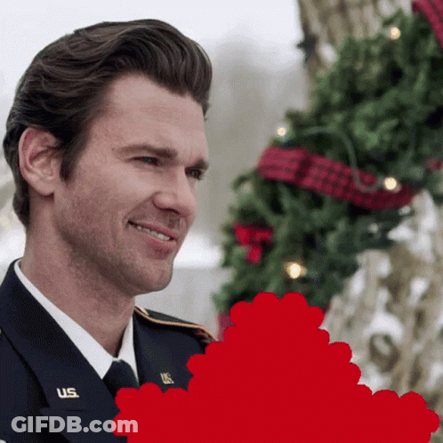A Man In A Military Uniform Has The Letters Us On His Sleeve GIF
