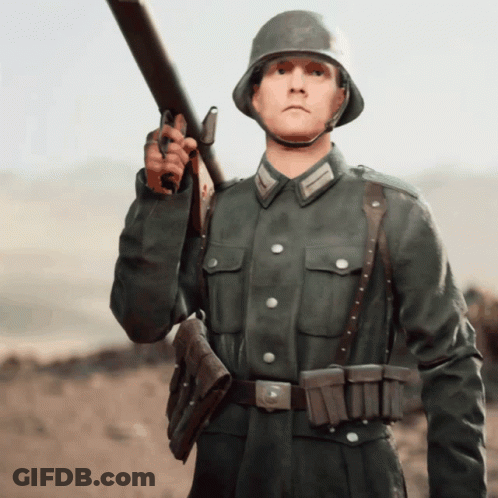 A Man In A Military Uniform Holds A Rifle GIF