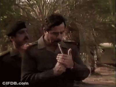 A Man In A Military Uniform Is Blowing A Whistle GIF