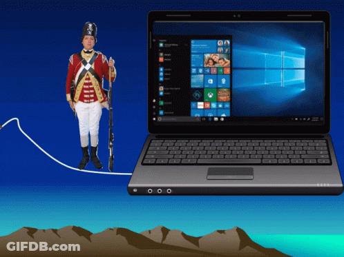 A Man In A Military Uniform Is Connected To A Laptop Computer GIF