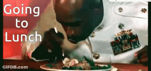 A Man In A Military Uniform Is Eating A Plate Of Food With The Words " Going To Lunch " Above Him GIF