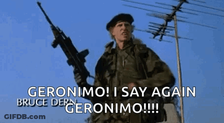 A Man In A Military Uniform Is Holding A Gun And Says Geronimo ! I Say Again Bruce Der Geronimo !!! GIF