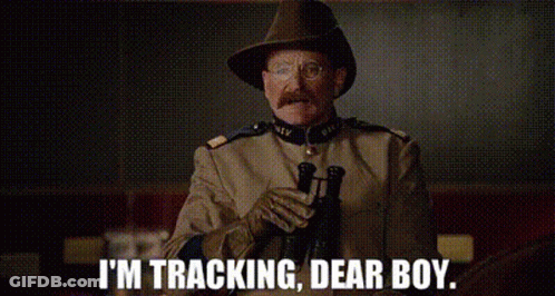 A Man In A Military Uniform Is Holding A Gun And Says `` I 'M Tracking , Dear Boy '' . GIF