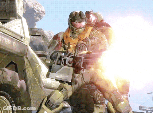 A Man In A Military Uniform Is Holding A Gun In Front Of A Vehicle That Says Step GIF