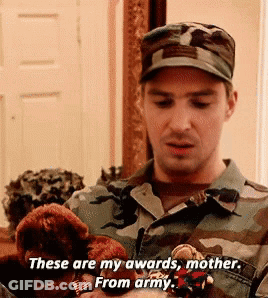 A Man In A Military Uniform Is Holding A Stuffed Animal And Saying These Are My Awards Mother From Army GIF