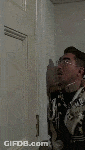 A Man In A Military Uniform Is Smiling And Says Here 'S On The Bottom GIF