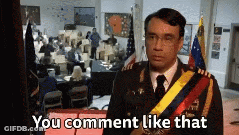 A Man In A Military Uniform Is Standing In Front Of A Crowd And Saying You Comment Like That . GIF