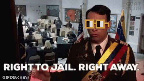 A Man In A Military Uniform Is Standing In Front Of A Crowd Of People And Says `` Right To Jail Right Away '' . GIF