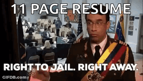 A Man In A Military Uniform Is Standing In Front Of A Room With People Sitting At Desks . GIF