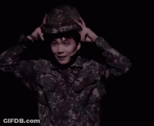 Man In Military Uniform Wearing Helmet GIF