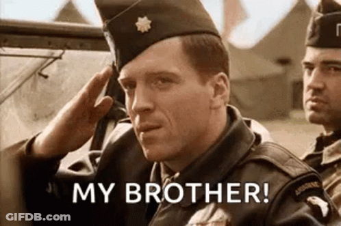 A Man In A Military Uniform Salutes While Another Man Says `` My Brother ! '' GIF