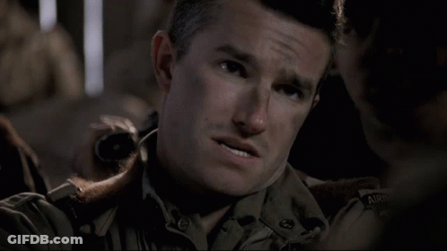 A Man In A Military Uniform Says " No Idea " In Front Of Another Man GIF