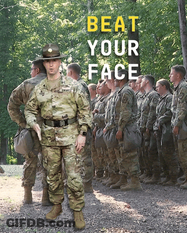 A Man In A Military Uniform Stands In Front Of A Group Of Soldiers With The Words Beat Your Face Written Above Him GIF