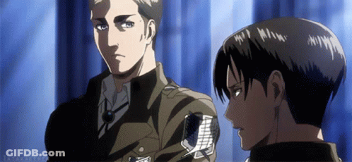 A Man In A Military Uniform Stands Next To Another Man In A Black Shirt With A Badge On His Arm GIF