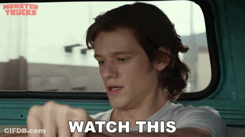 A Man In A Monster Trucks Truck Says " Watch This " GIF