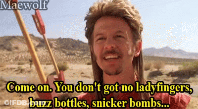 A Man In A Mullet Is Smiling And Holding A Spear And Says Come On You Don 'T Got No Lady Fingers GIF