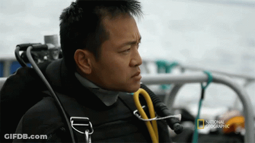A Man In A National Geographic Scuba Gear GIF