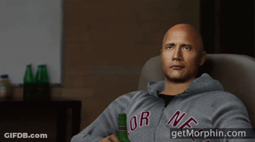 A Man In A New York Sweatshirt Holds A Beer Bottle GIF