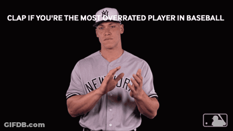 A Man In A New York Yankees Uniform Is Clapping GIF