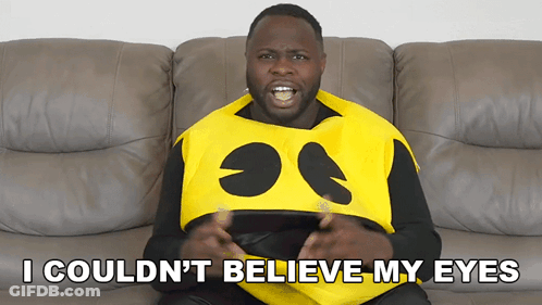 A Man In A Pac Man Costume Is Sitting On A Couch And Says I Couldn T Believe My Eyes GIF