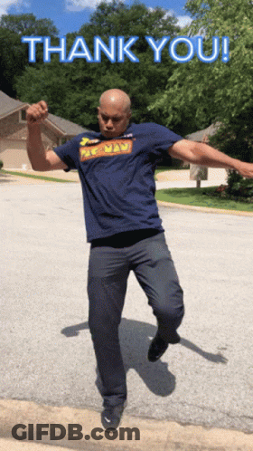 A Man In A Pac Man Shirt Is Jumping In The Air With The Words Thank You Below Him GIF