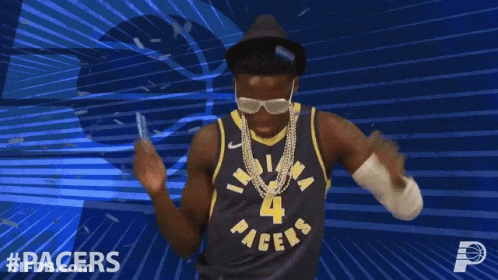 A Man In A Pacers Jersey Is Dancing With His Arms In The Air GIF