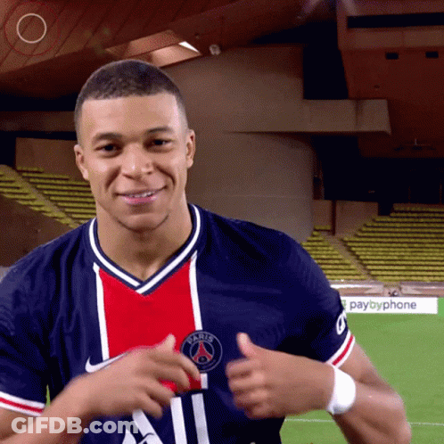 A Man In A Paris Shirt Is Giving A Thumbs Up Sign GIF