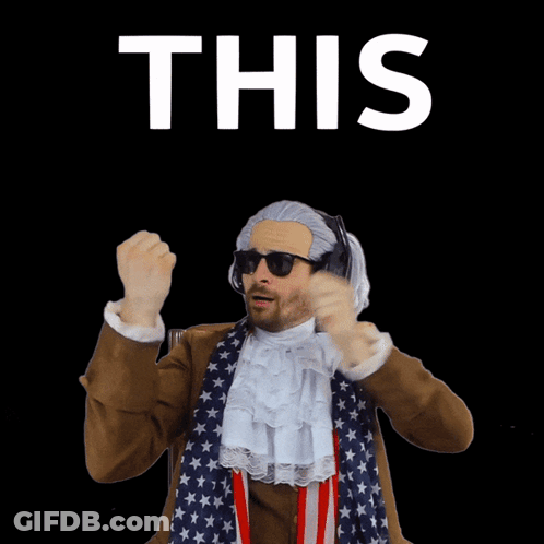 A Man In A Patriotic Costume Holds Up His Finger In Front Of A Sign That Says ' This ' GIF