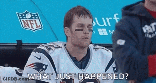 A Man In A Patriots Jersey Is Sitting In A Locker Room And Talking To Someone . GIF