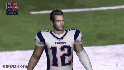 A Man In A Patriots Jersey Is Standing On A Field GIF