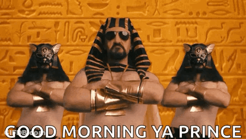 A Man In A Pharaoh Costume Is Standing In Front Of A Wall That Says " Good Morning Ya Prince " GIF