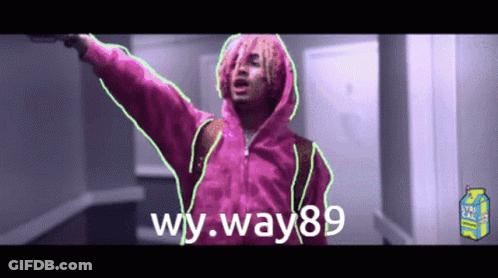 A Man In A Pink Hoodie Is Holding A Gun And Says Wy.way89 On The Bottom GIF