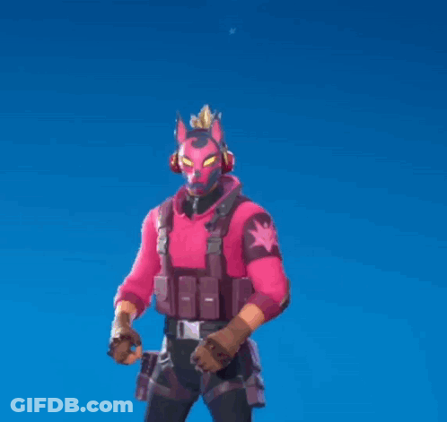 A Man In A Pink Mask Is Holding A Pair Of Scissors In His Hand . GIF