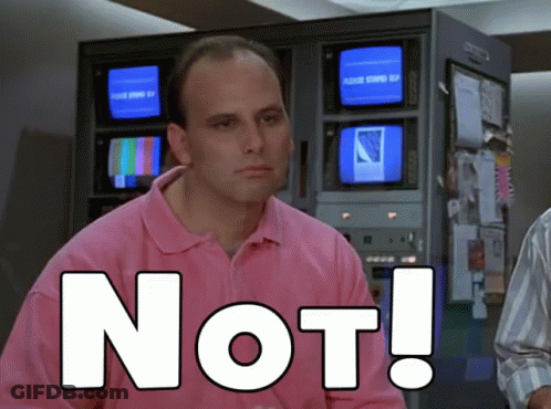 A Man In A Pink Shirt Has The Word Not Written On His Chest GIF
