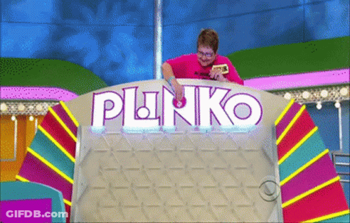 A Man In A Pink Shirt Is Playing A Game Called Punko GIF
