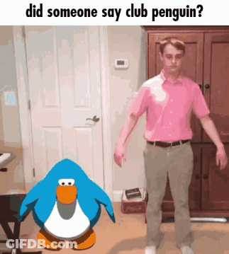 A Man In A Pink Shirt Is Standing Next To A Penguin In A Room GIF