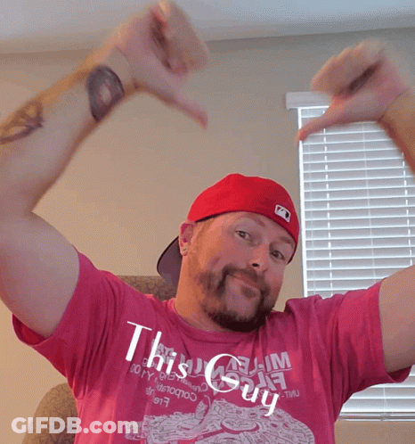 A Man In A Pink Shirt That Says This Guy GIF
