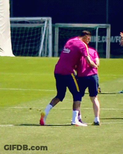A Man In A Pink Shirt With The Word Beko On It GIF