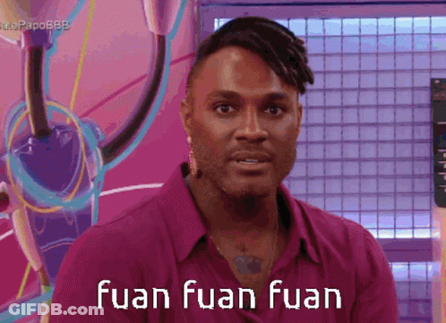 A Man In A Pink Shirt With The Words Fuan Fuan Fuan GIF